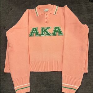 Pink AKA Polo Sweater with Green Lettering